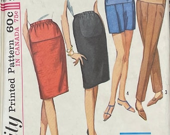 May include: A vintage sewing pattern for three different skirts. The skirts are shown in red, black, and blue. The pattern is labeled "Printed Pattern 60c IN CANADA 75c" and "SIMPLE TO SEW".