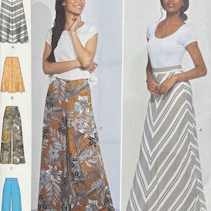 May include: Simplicity pattern S8885 featuring designs for skirts and wide-leg pants. The pattern includes various styles, such as a striped skirt and floral print pants. Size range is U.S. 6-14. The Simplicity logo and "Since 1927" are also visible.