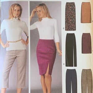 May include: A sewing pattern featuring a white turtleneck sweater, a pair of brown and white plaid pants, and a variety of skirts. The skirts include a purple skirt with a slit, a black skirt, a brown skirt, a patterned skirt, and a plaid skirt.