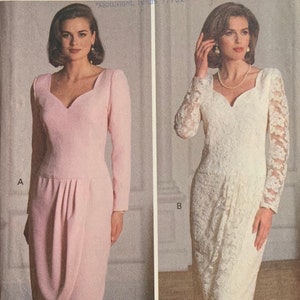 May include: Two women's dresses, one pink and one white. The pink dress has a sweetheart neckline and long sleeves. The white dress is made of lace and has a square neckline and long sleeves.