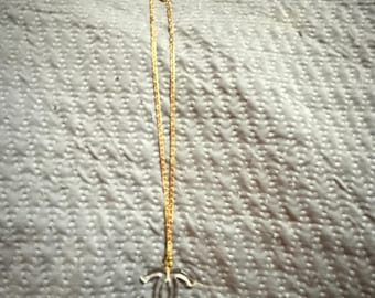 Upcycled clear Chanel charm necklace