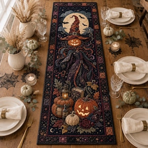 May include: A rectangular fabric table runner featuring a detailed Halloween-themed print of a witch with a jack-o'-lantern head, bats, a full moon, glowing pumpkins, a lantern, and an old book, all set against a dark, starry night background.