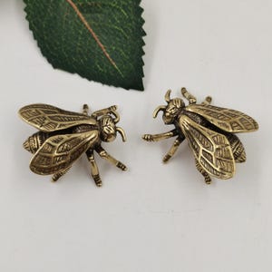 Conjunto de dos figuras de moscas hechas a mano de cobre puro, decoración retro de insectos.