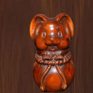 Een puur Chinees, handgesneden konijnenbeeldje van buxushout, kostbaar en verfijnd, een echt verzamelobject.