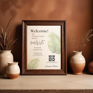May include: A wooden framed sign with the text "Welcome!" and "Wifi". The sign includes space for network and password details, a QR code and the words "Simply Home". The frame is dark brown, and the background is a warm beige.