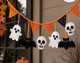 May include: A crochet Halloween garland featuring orange and purple triangular pennants interspersed with white ghosts, black bats, and white skulls. The garland is suspended by an orange yarn string and includes a circular logo reading Charm Loop Crochet.