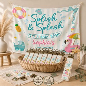 May include: A fabric banner with light blue stripes featuring the text Splish & Splash IT'S A BABY BASH! Sophia's BABY SHOWER, decorated with a life preserver, pineapple, baby carriage, flamingo, and umbrella. A basket contains matching keychains.