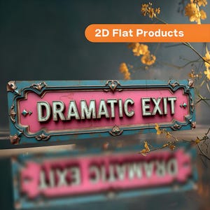 May include: A rectangular sign with a pink center and a teal border featuring ornate, metallic-toned decorative scrollwork. The text "DRAMATIC EXIT" is printed in large, light-colored, block-style letters across the center of the pink panel.