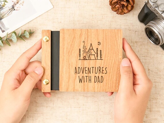 A palm-sized photo book with a handcrafted wooden cover is the kind of deeply personal keepsake that makes someone tear up — and it fits in a stocking.