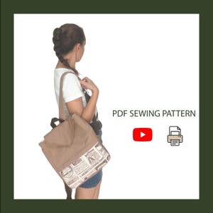 May include: A tan backpack with a newspaper print bottom panel, featuring a flap closure and shoulder straps. The text PDF SEWING PATTERN is displayed next to a red YouTube icon and a printer icon, indicating a digital file for home printing.