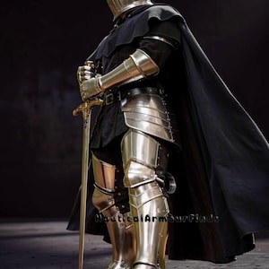 May include: Full suit of polished steel armor, including a helmet, shoulder guards, arm guards, and leg armor. The armor is worn over a black tunic and cape. A long sword with a decorative hilt is held in front. The image is set against a dark background.