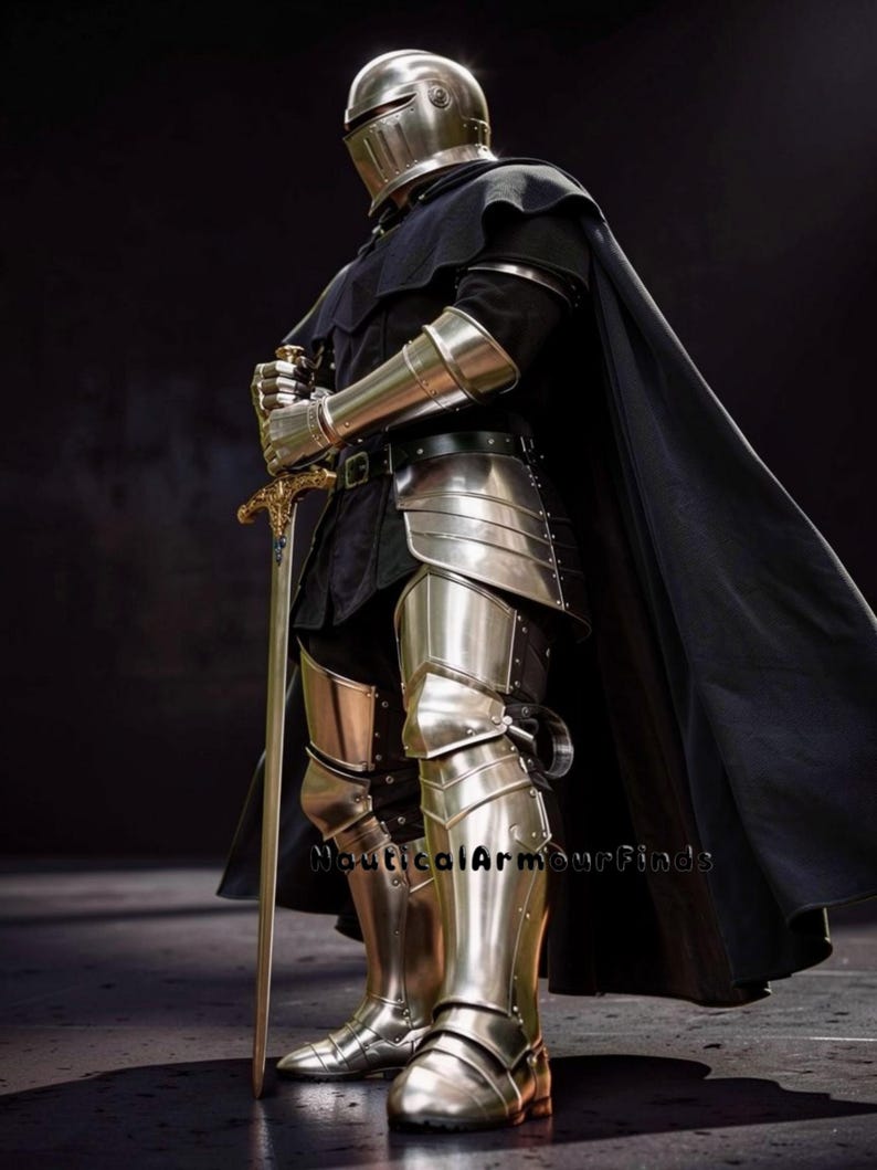May include: Full suit of polished steel armor, including a helmet, shoulder guards, arm guards, and leg armor. The armor is worn over a black tunic and cape. A long sword with a decorative hilt is held in front. The image is set against a dark background.