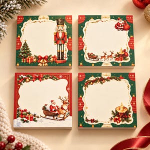 May include: Four square paper note pads featuring Christmas themes. One shows a nutcracker and tree, another Santa with a sleigh, a third with Santa and reindeer, and the fourth with a candle. Each has a cream center and green and red borders.