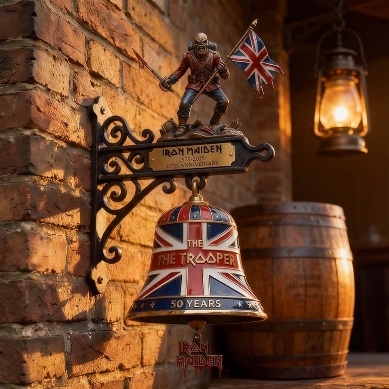 May include: A decorative Iron Maiden sign featuring a bell with a Union Jack design and the text "The Trooper". A figurine of Eddie, the band's mascot, stands above a plaque that reads "Iron Maiden 1975-2025 50th Anniversary".