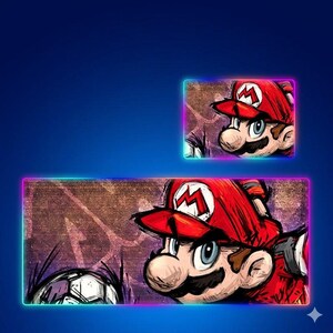 May include: A rectangular desk mat and a smaller matching rectangular mouse pad, both featuring a stylized illustration of Mario wearing a red cap with an M emblem, set against a textured brown background with a glowing neon-colored border.