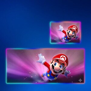 May include: Two rectangular desk mats featuring a graphic of Mario in a red cap, blue overalls, and white gloves against a purple and pink cosmic background. Each mat is outlined with a vibrant, glowing neon light border in shades of blue and pink.