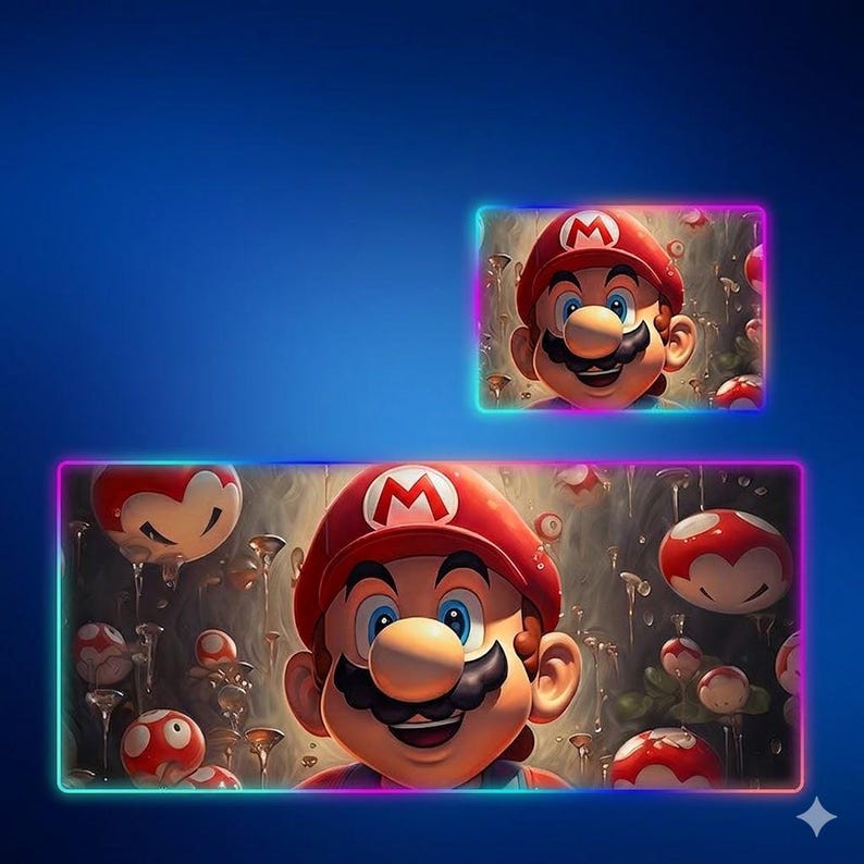 May include: A rectangular desk mat and a smaller matching rectangular mouse pad, both featuring a vibrant illustration of the character Mario with a red hat and mustache, surrounded by floating red and white mushrooms against a dark background.