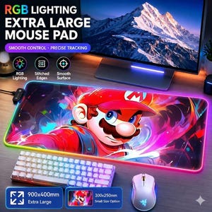 May include: An extra large rectangular mouse pad featuring RGB lighting along the stitched edges and a vibrant graphic of Mario. The text reads RGB LIGHTING EXTRA LARGE MOUSE PAD, SMOOTH CONTROL, PRECISE TRACKING, 900x400mm Extra Large, and 300x250mm Small Size Option.