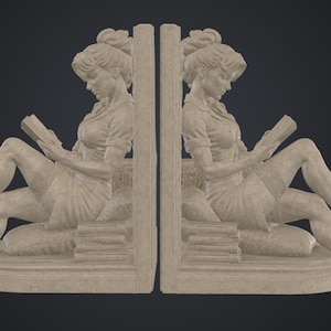Peut inclure: Une paire de serre-livres de couleur pierre beige représentant une silhouette sculptée assise sur un coussin en train de lire un livre. La silhouette a les cheveux attachés, porte un haut à manches courtes et une jupe, appuyée contre un panneau.