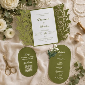 May include: A wedding invitation suite featuring a rectangular card with olive green laser-cut floral gatefold covers, a white center panel with text, and two oval-shaped olive green cards for RSVP and details, including a QR code and floral accents.