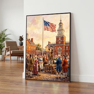 May include: A framed wall art print depicting a historical scene with a person standing on a wooden platform reading a document to a crowd. An American flag with thirteen stars flies on a tall pole in front of a large brick building with a clock tower.