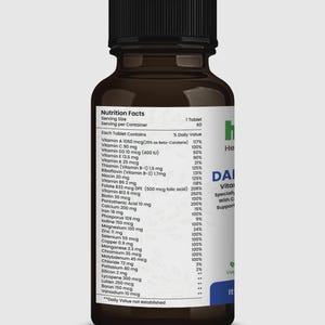 May include: A brown bottle of daily vitamins with a black cap. The label includes a nutrition facts panel listing vitamins and minerals. The bottle is designed to support overall health with Vitamin C.