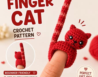 Könnte beinhalten: Ein roter Fingerring in Katzenform, gehäkelt, mit langem Schwanz, der an einem Finger getragen wird. Das Bild enthält den Text "FINGER CAT CROCHET PATTERN" und "BEGINNER FRIENDLY". Der Ring ist ein Katzendesign mit schwarzen Augen und Schnurrhaaren.