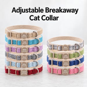 May include: Adjustable breakaway cat collars in various colors including beige, blue, purple, gray, light blue, red, white, green, dark blue, and pink. Each collar features a round beige tag with a name and phone number printed on it.