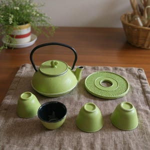 Green Ceramic Tea Set - Rustic Teapot, Textured Trivet, and Four Matching Cups for Tea Lovers