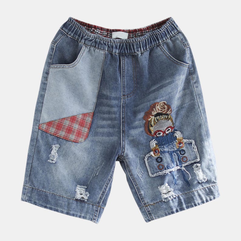 Baggy Denim Shorts | Printed Wide Leg Jorts | Daily Wear | Harajuku Streetwear Style

Light wash denim shorts with cartoon patch design and relaxed baggy streetwear fit