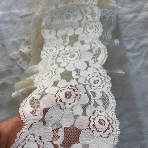 White stretch lace 6” wide 160” long