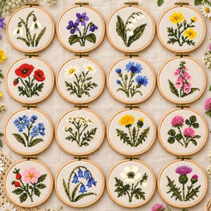 May include: A collection of sixteen circular wooden embroidery hoops, each containing a cross-stitch pattern of a different wildflower. The flowers include snowdrops, violets, lilies, poppies, daisies, cornflowers, foxgloves, and thistles.