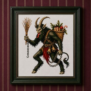 May include: A framed cross-stitch embroidery depicting a dark, horned Krampus figure with a long red tongue, holding a bundle of twigs and a chain. The figure carries a woven basket filled with gifts, pine branches, and a candy cane.
