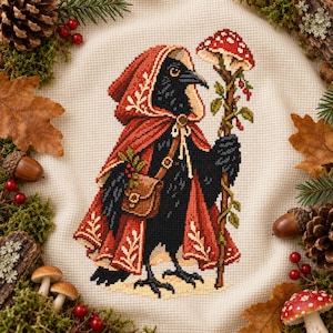May include: A cross-stitch embroidery on cream fabric depicting a black crow wearing a red hooded cloak with white leaf patterns. The crow carries a brown satchel and holds a tall staff topped with a red and white spotted mushroom.