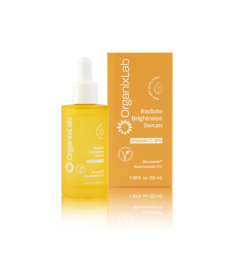 May include: A yellow OrganixLab Radiate Brightness Serum bottle and box. The serum bottle has a white dropper and the box has the text "Radiate Brightness Serum Vitamin C 8%" and "Bicowhite Niacinamide 5%" and "1.69 fl. oz. (50 ml)".