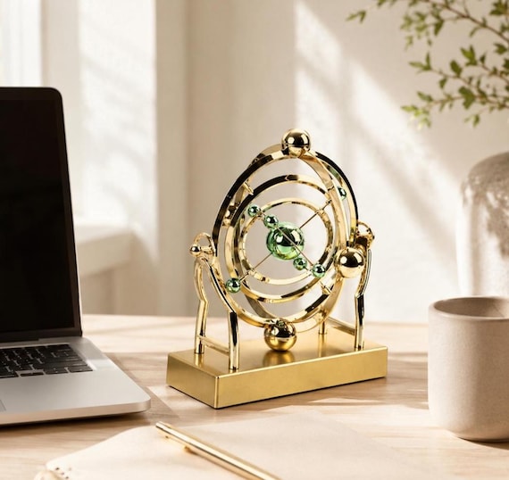 A mesmerizing celestial orbit kinetic sculpture that turns a desk into a tiny solar system — satisfying to watch and genuinely conversation-starting.