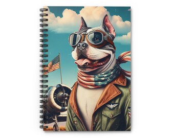 May include: A white and black dog wearing aviator goggles and a red, white, and blue scarf. The dog is wearing a green and brown pilot jacket and is standing in front of a vintage airplane. The dog is looking to the right of the image.
