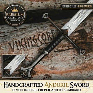 May include: Handcrafted Anduril sword, an elven-inspired replica with a scabbard. The blade is forged steel with high carbon content. The hilt is black with a silver crossguard and pommel. The blade features runes and an emblem. The text "VIKINGCORE" is carved into the wood.
