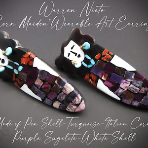 May include: A pair of "Corn Maiden" wearable art earrings made by Warren Nieto. The earrings are made of pen shell, turquoise, Italian coral, purple sugilite, and white shell.