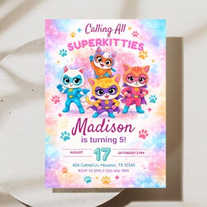 May include: A birthday invitation card featuring four cartoon cats in superhero costumes against a pastel tie-dye background. Text reads: Calling All SUPERKITTIES, Madison is turning 5!, August 17, Saturday 2 PM, 456 Cattail Ln, Houston, TX 12345, RSVP TO EMILY (123) 456-7890.