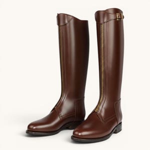 May include: A pair of tall, brown leather riding boots. The boots have a zipper down the front and a buckle at the top. The boots are approximately 16 inches tall.