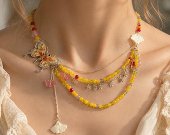 Collar de mariposa con cuentas: gargantilla de mariposa esmaltada en capas con dije de estrella.
