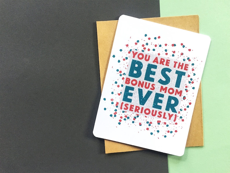 May include: A white card with a red and blue confetti pattern. The card says "You are the best bonus mom ever (seriously)"