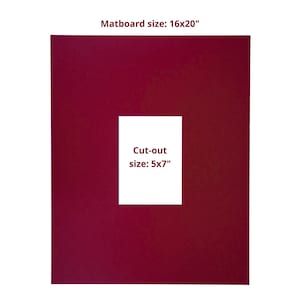May include: A cherry red museum mat with a rectangular center cut-out. The text reads Cherry Red Museum Mat, Matboard size: 16x20", and Cut-out size: 5x7". The mat is a solid, deep red color with a clean, centered white rectangular opening.