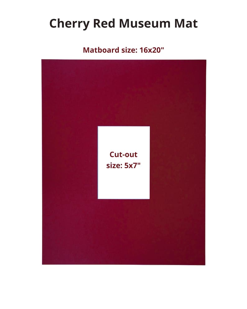 May include: A cherry red museum mat with a rectangular center cut-out. The text reads Cherry Red Museum Mat, Matboard size: 16x20", and Cut-out size: 5x7". The mat is a solid, deep red color with a clean, centered white rectangular opening.