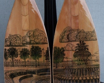 Wooden Canoe Paddles, with Drawing of Marriage Proposal Setting, display stand not included.  CUSTOM MADE for a Bride & Groom.
