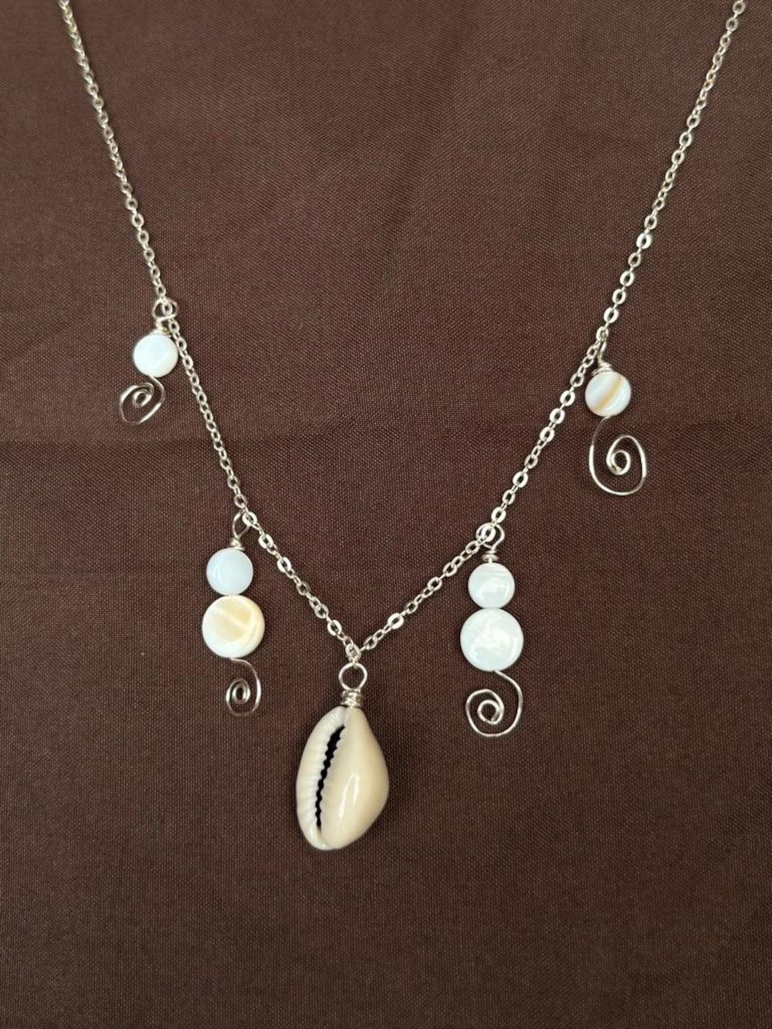 Silver Cowrie Shell Pendant Necklace With Spiral Charms & Shell Circle ...
