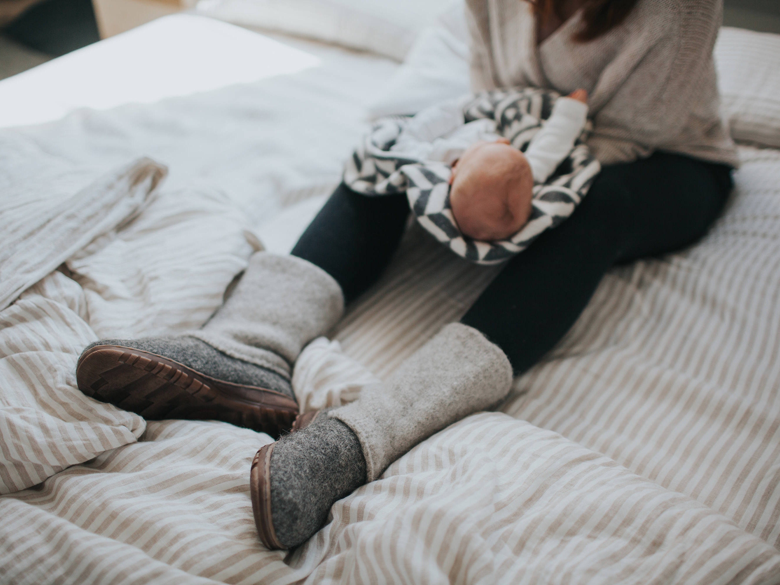 Boiled wool shoes from organic wool with rubber soles and knitted uppers
