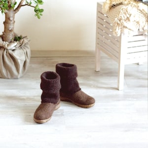 Boiled wool shoes from organic wool with rubber soles and knitted uppers