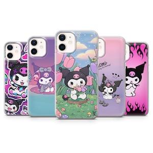 May include: Five phone cases with colorful designs featuring a cartoon character with black ears and a skull. The cases have different backgrounds, including flowers, clouds, and a pink flame design. The cases are made of clear plastic.